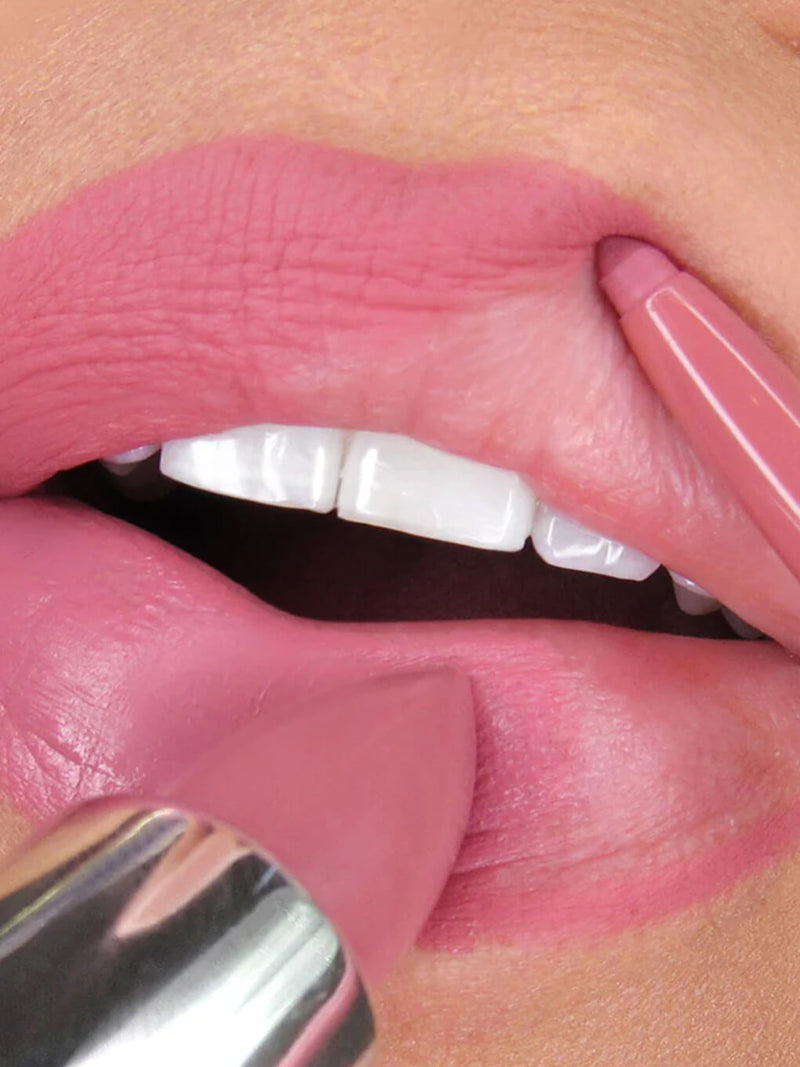 Pippy -- pink waterproof lip liner and lipstick on white background