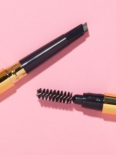 unibrow universal spoolie and pencil flat lay on pink background