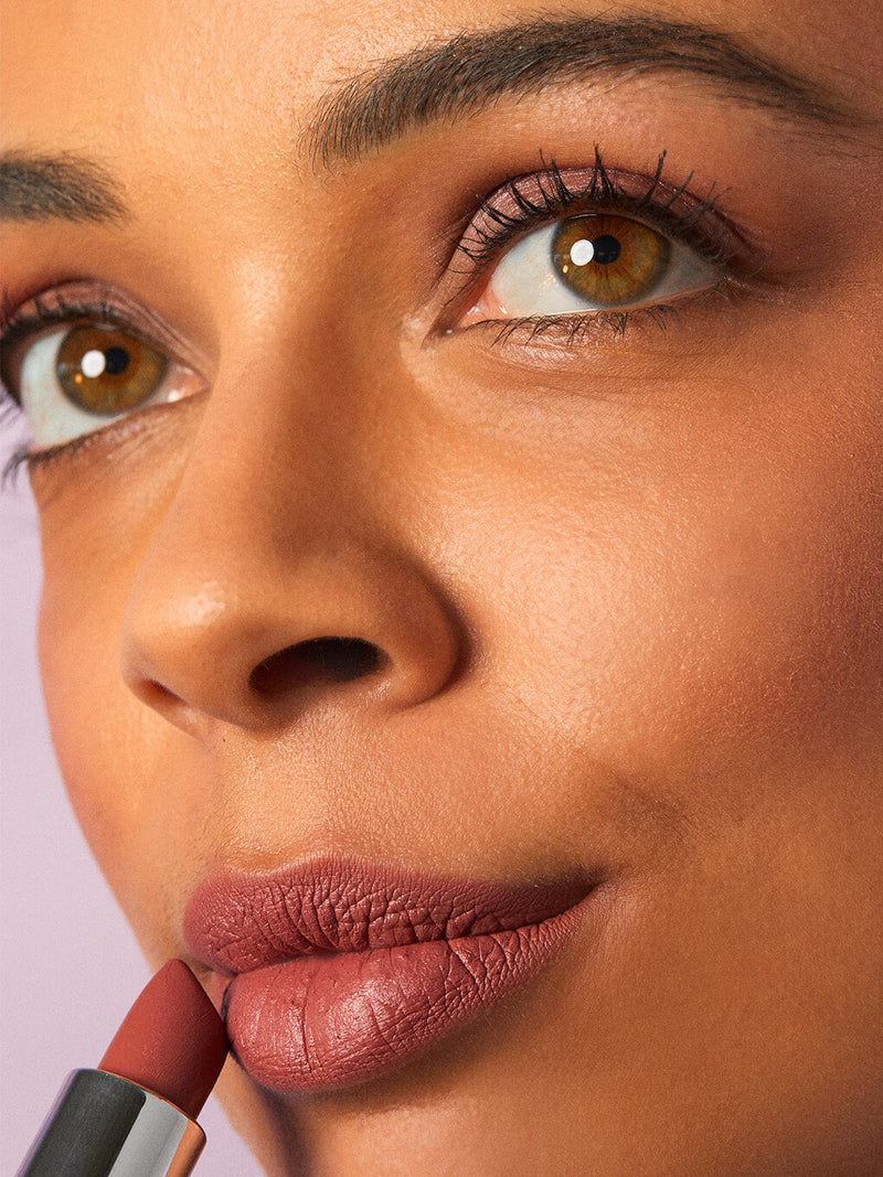 meow -- matte lip velour lipstick on white background