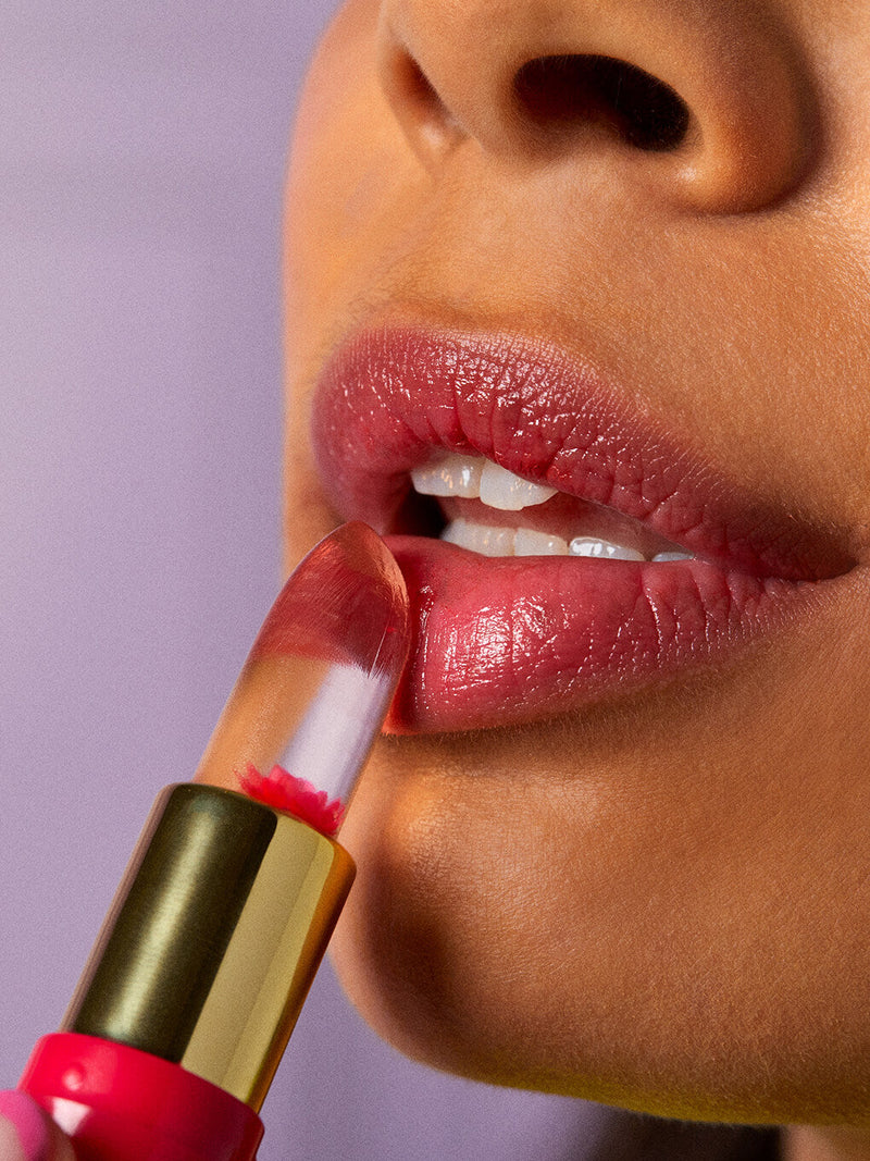 color changing ph flower lip balms on white background
