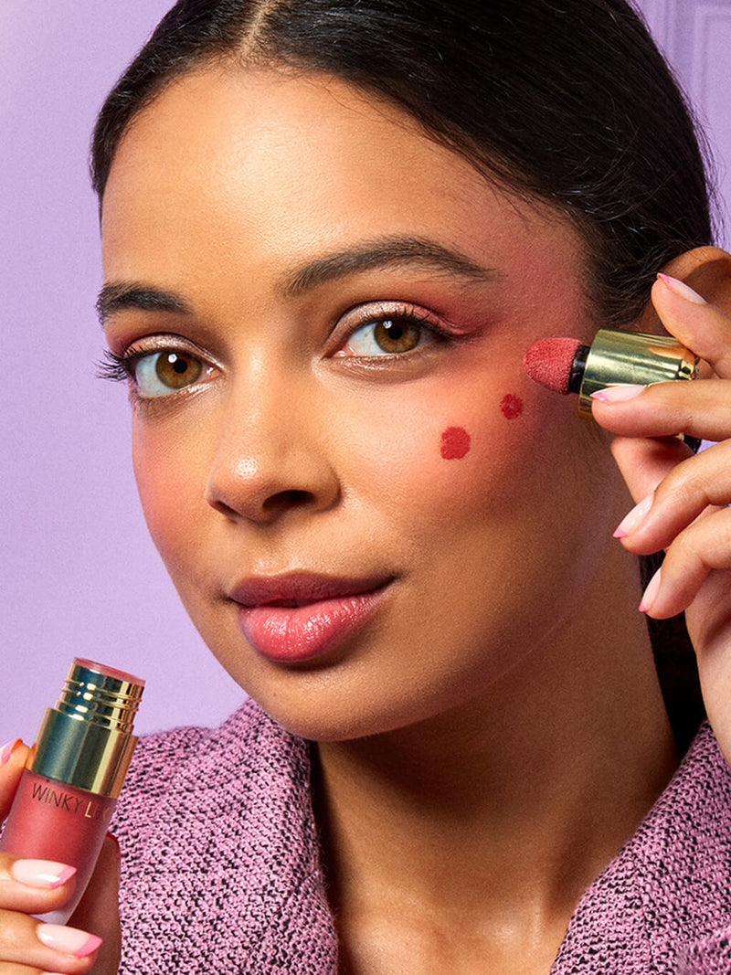 noble -- cheeky rose liquid blush with cap off on white background
