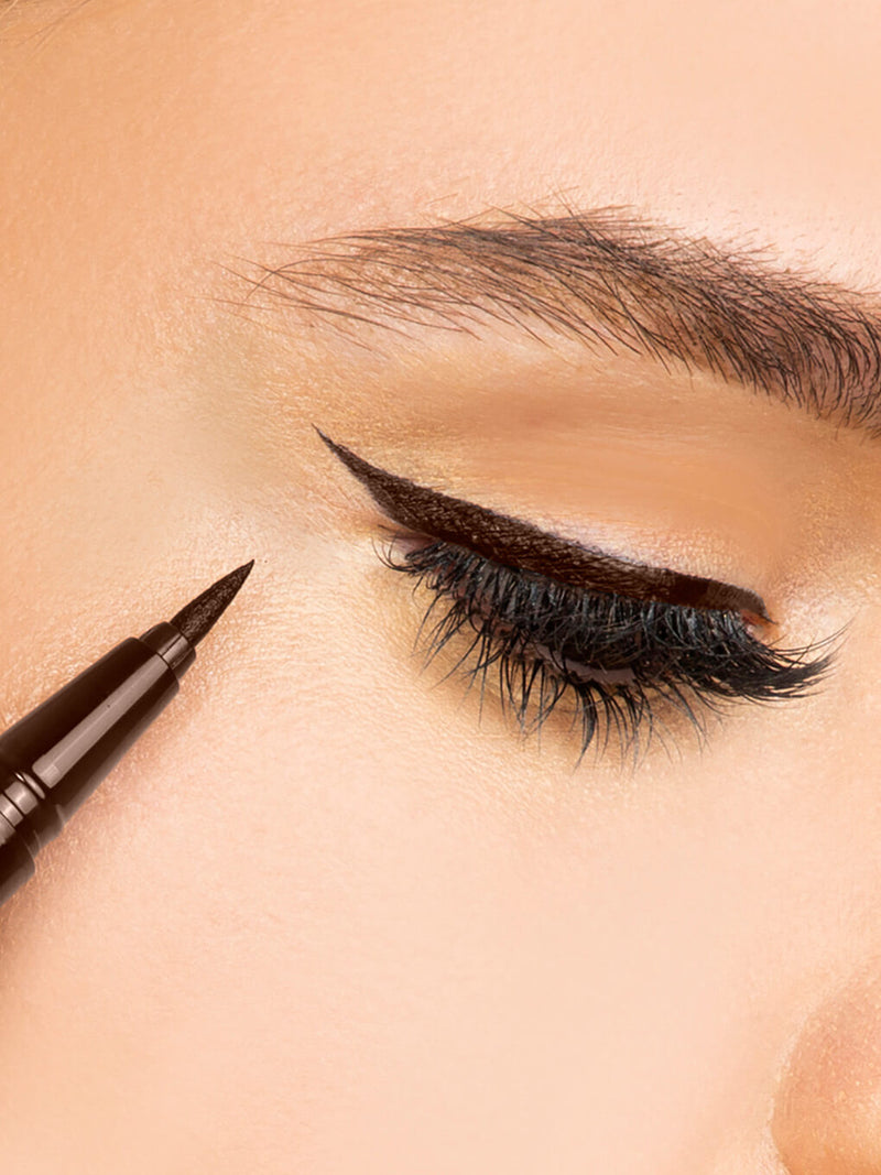 Chocolate -- meowza brown liquid eyeliner with cap off on white background