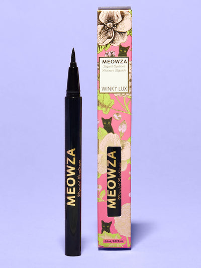 Black -- meowza liquid eyeliner and box standing with purple background