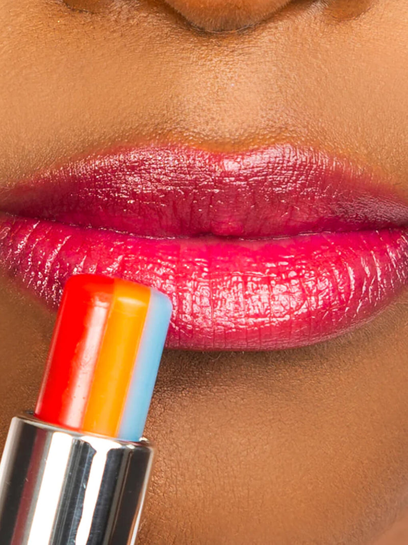 rainbow tinted ph lip balm on white background