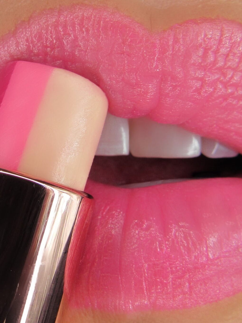 strawberry rose tinted lip balm on white background