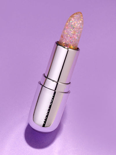 rainbow confetti -- glitter confetti ph lip balm standing up on purple background